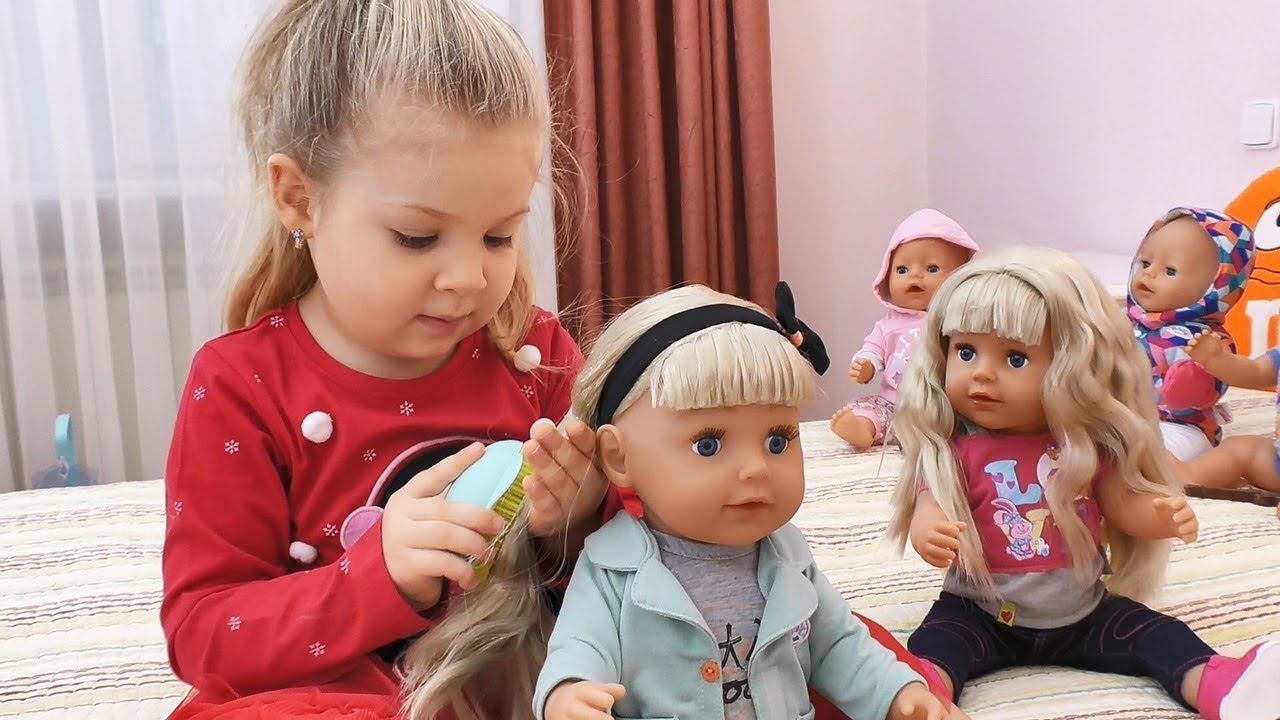 diana playing with baby born doll