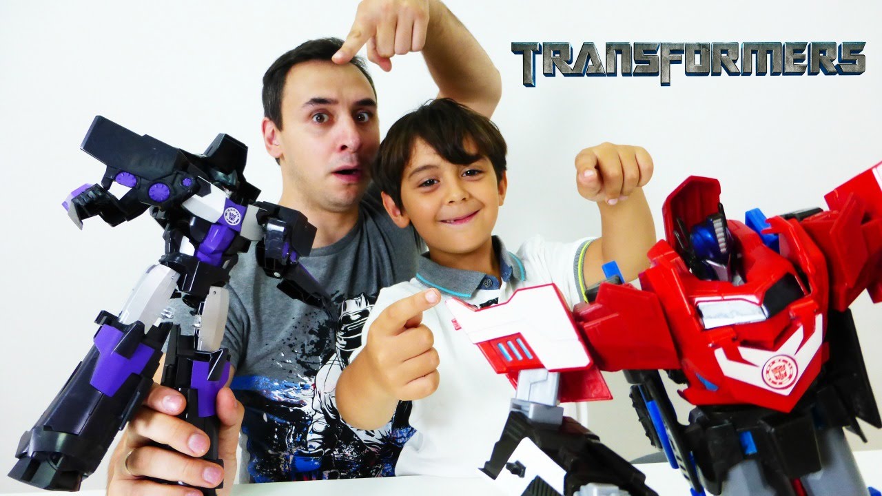 TRANSFORMERY-Video-s-igrushkami-dlya-malchikov-ot-Papy-Roba-i-YArika-Sorevnovanie-TRANSFORMEROV