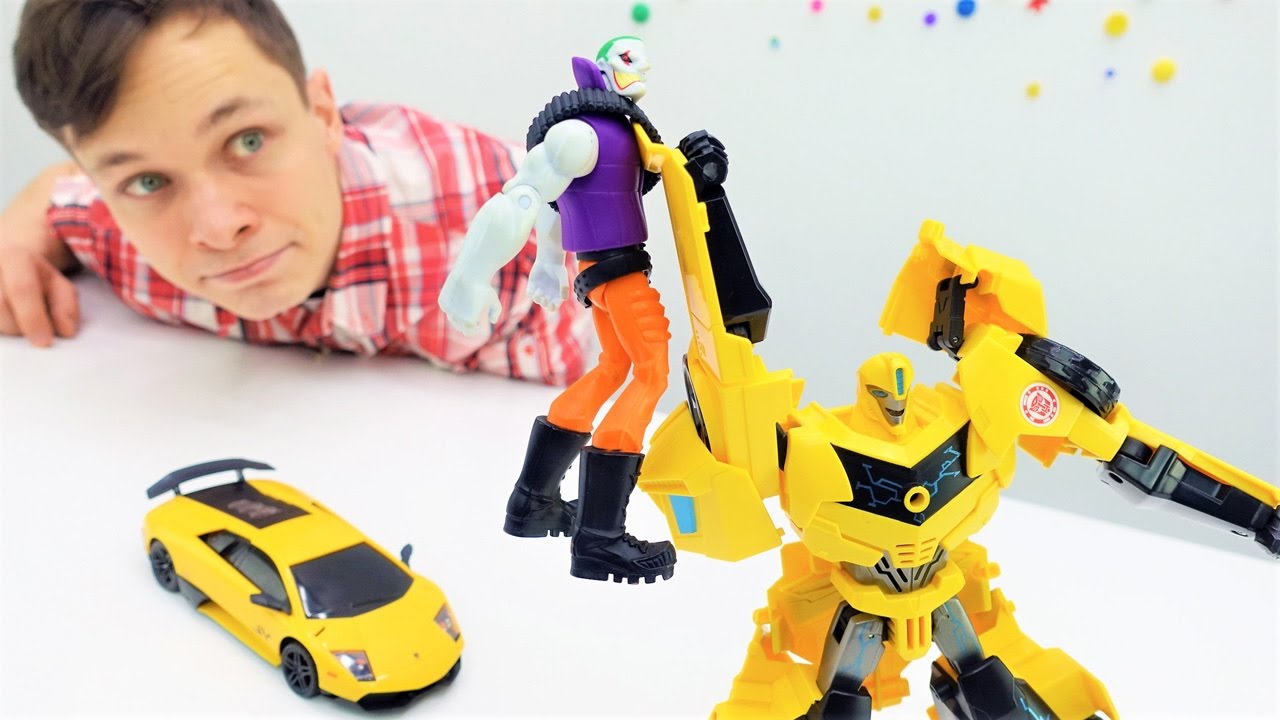 Video-s-igrushkami-Transformery-Igry-v-mashinki-dlya-detej-Dzhoker-ugnal-novoe-avto-Fedora