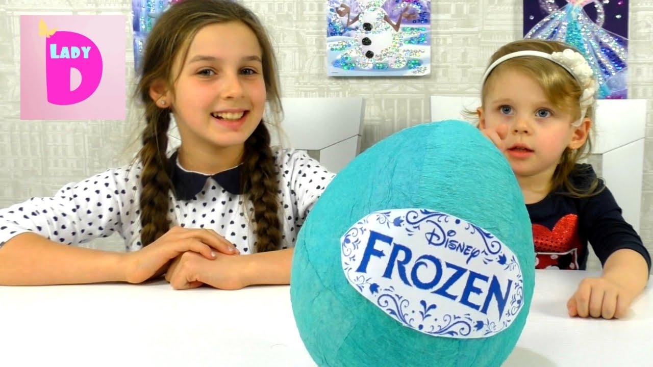 Holodnoe-Serdtse-Frouzen-otkryvaem-Bolshoe-yajtso-s-syurprizami-Frozen-oeuf-avec-une-surprise