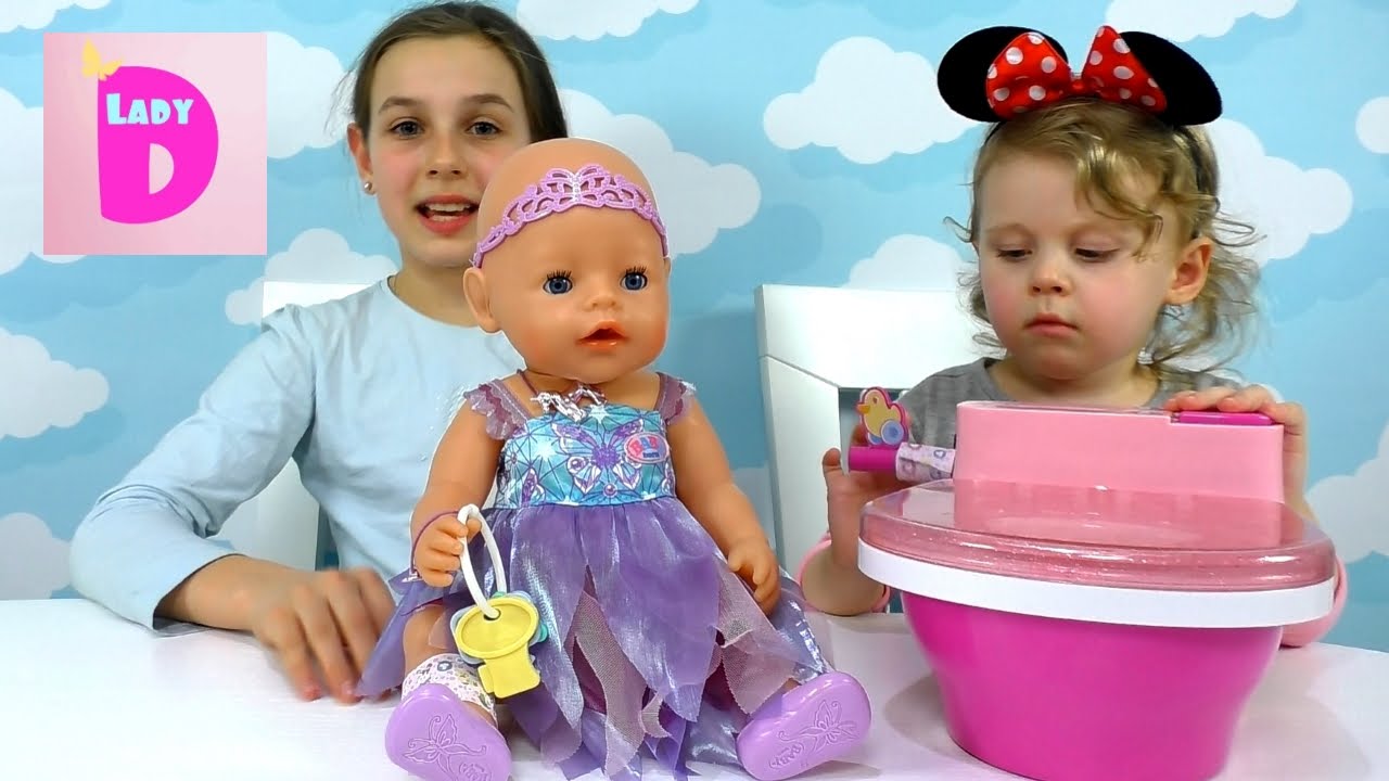 Kukla-Bebi-Born-Interaktivnyj-unitaz-dlya-Bebi-Borna-Baby-doll-poops-peeps-on-Toilet-toy