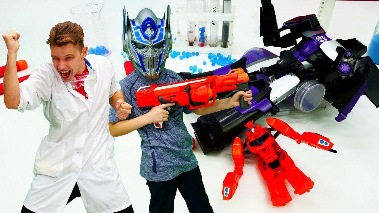 Igrushki-Roboty-SHPION-u-Deseptikonov-Maska-Transformery-i-blaster-Nerf-Video-igry-dlya-malchikov