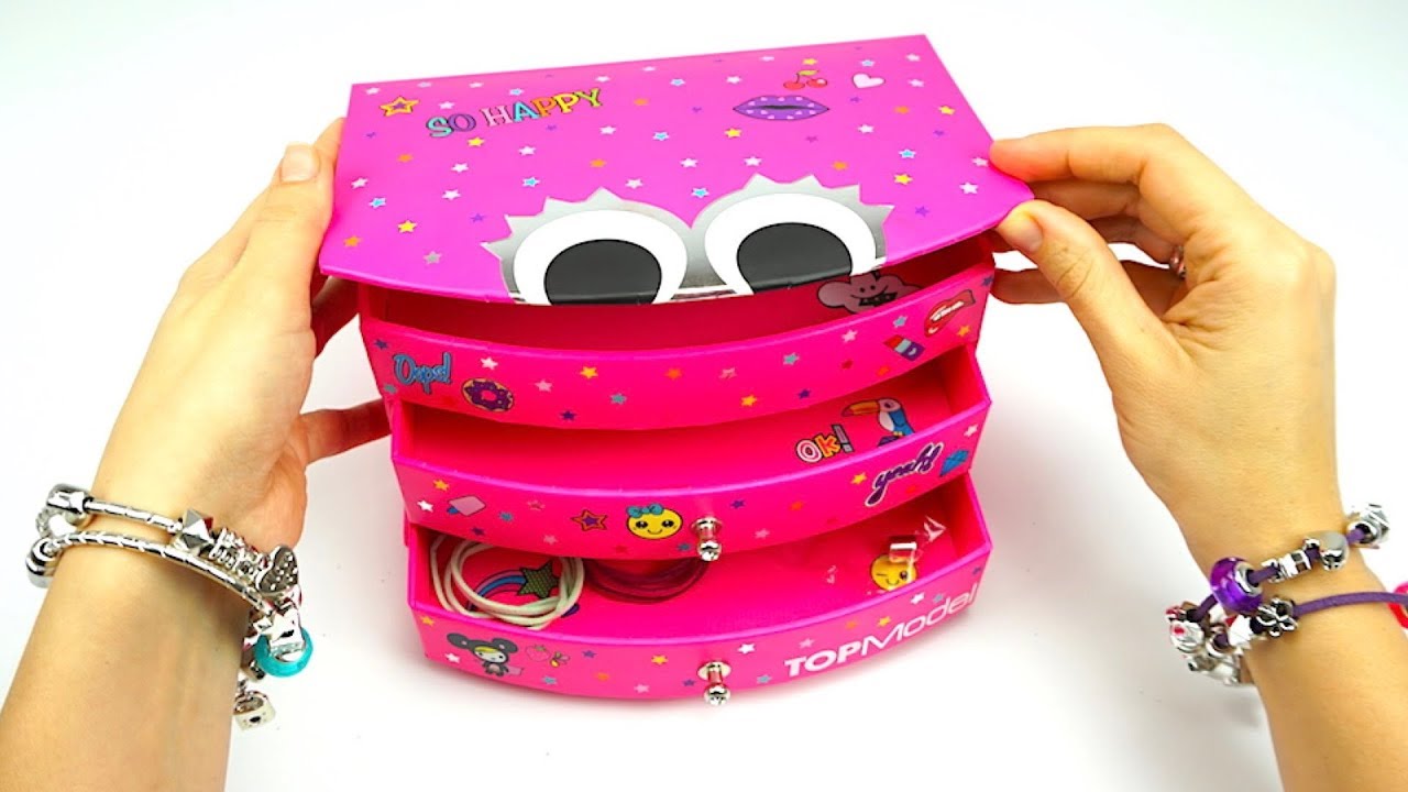 Razvivayushhee-video-dlya-detei-raspakovyvaem-korobku-syurpriz-uchimsya-delat-braslety-i-ukrasheniya-Igr