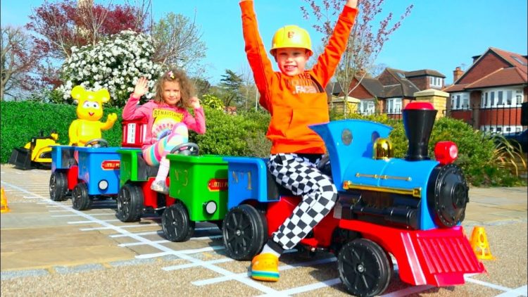 Katy-and-Max-build-railway-for-kids-ride-on-train