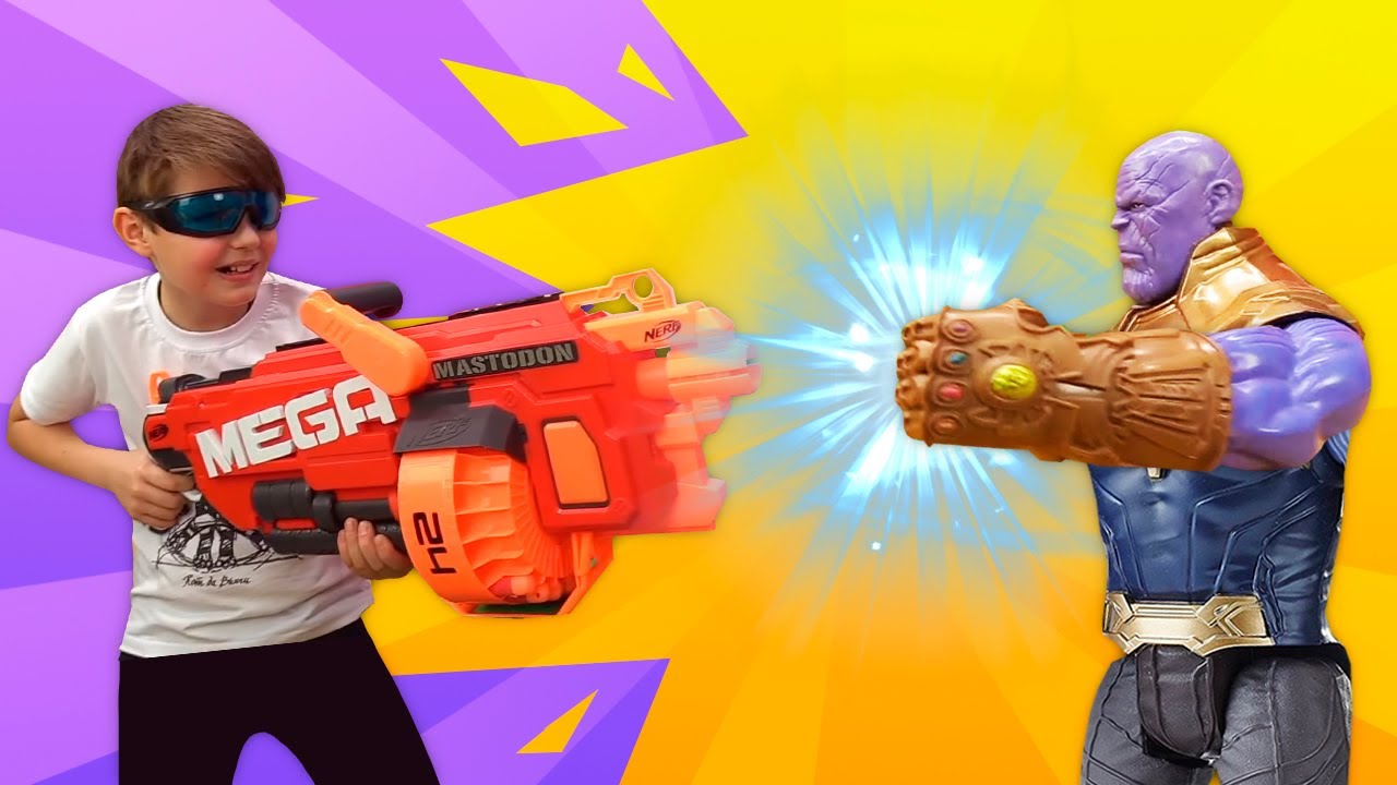 Igry-strelyalki-Nerf-Tanos-i-novaya-Vojna-Beskonechnosti-Onlajn-video-s-supergeroyami