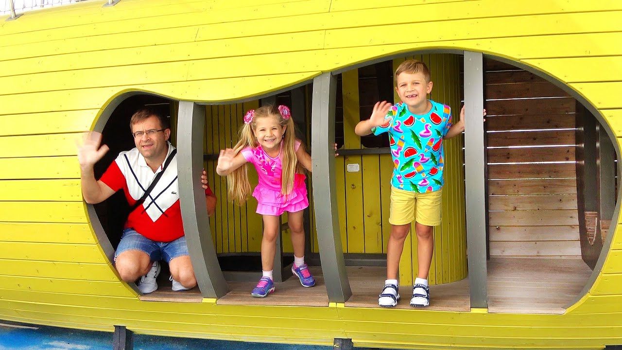Diana-and-Roma-play-with-Dad-at-the-playground